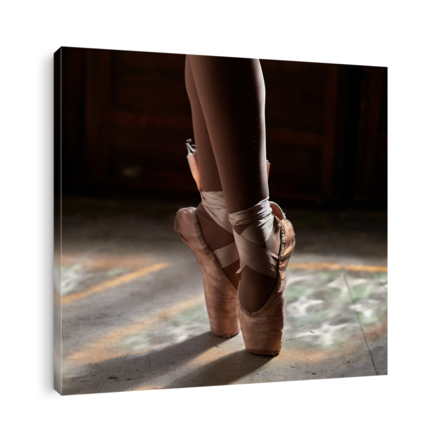 closeup of ballerina feet  in pointe shoes